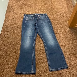 Maurices original flare bottom jeans in a dark wash size 7/8 x-s